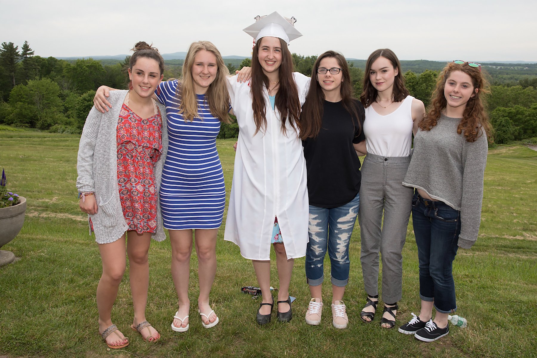 Broccoli Hall graduate with friends