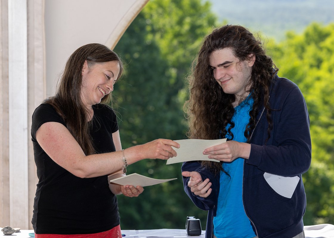 Student accepts award