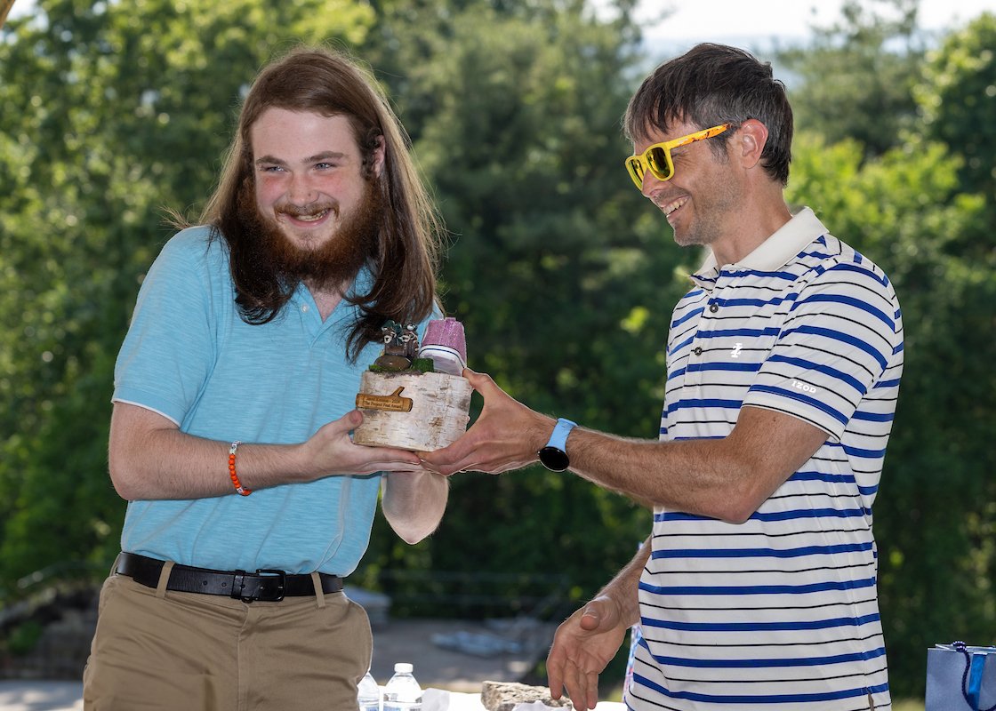 Student accepts award