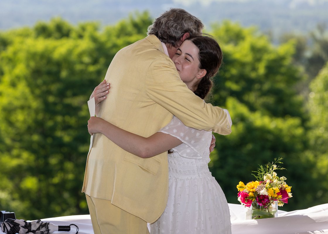 Student hugs advisor